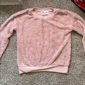 light pink fluffy sweater
